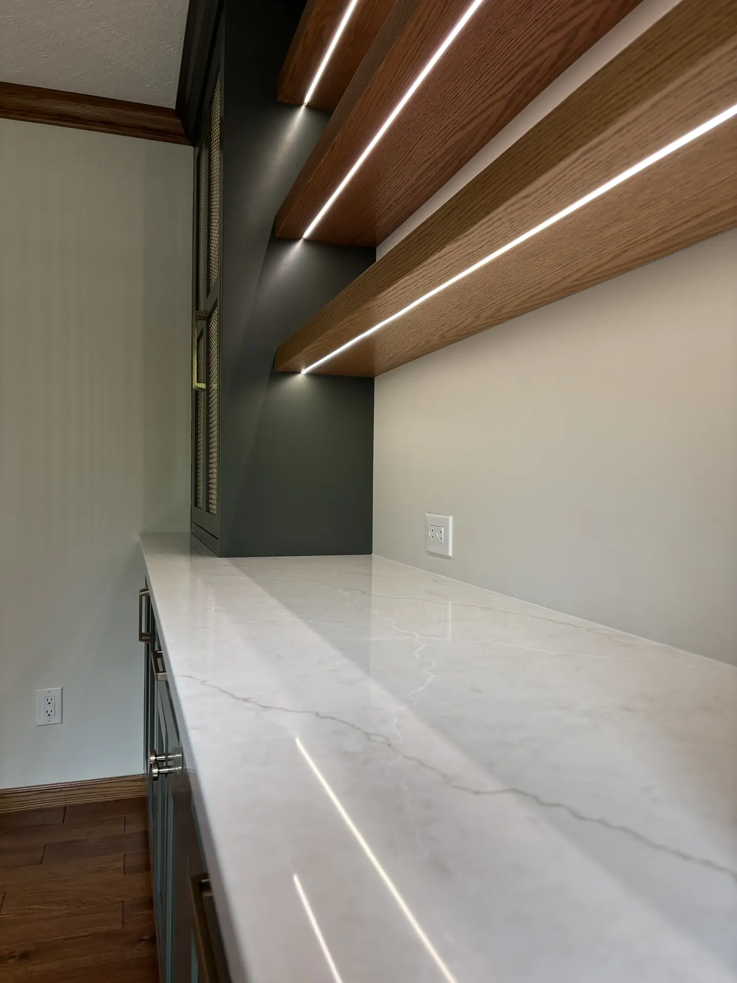 LED-lit shelves and quartz countertop